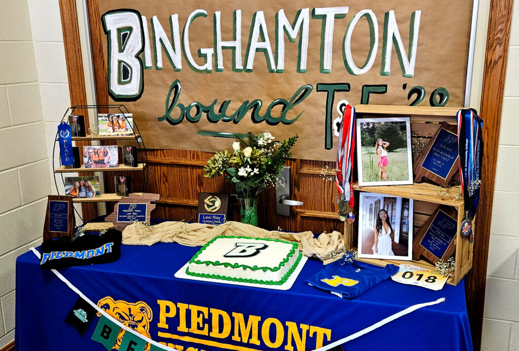 Lexi Ray’s memorabilia table for Monday’s signing ceremony at Piedmont. (Photo by Joe Medley)