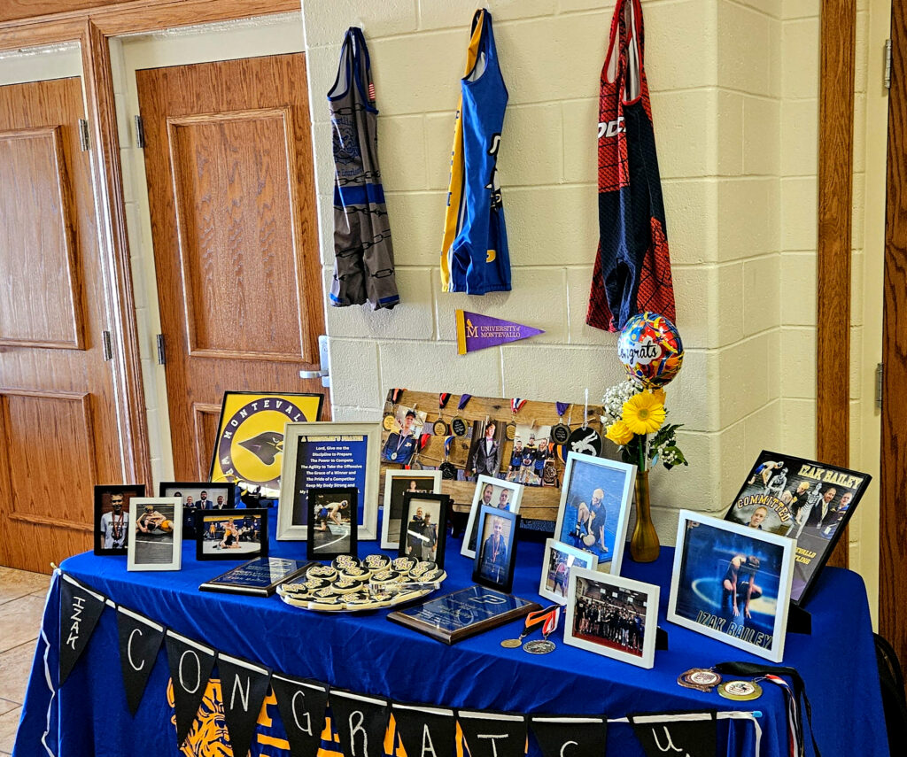 Izak Bailey’s memorabilia table for Monday’s signing ceremony. (Photo by Joe Medley)