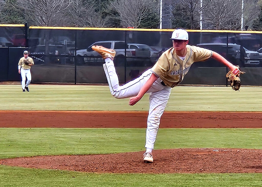 Jacksonville’s Matthew Parker follows through on a pitch against Donoho during Thursday’s Spring Experience action at Choccolocco Park. (Photo by Joe Medley)