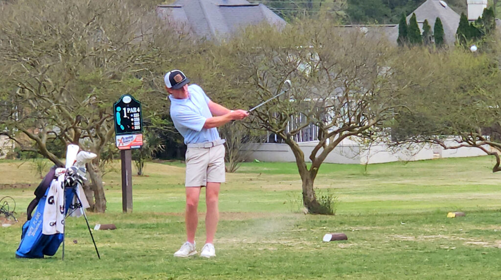 White Plains’ Sawyer Edwards chips on No. 18 during Tuesday’s final round of the Calhoun County tournament at Pine Hill Country Club. (Photo by Joe Medley)