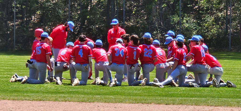 Pleasant Valley coach Dalton Turner talks to the Raiders after Saturday’s game at Donoho. (Photo by Joe Medley)